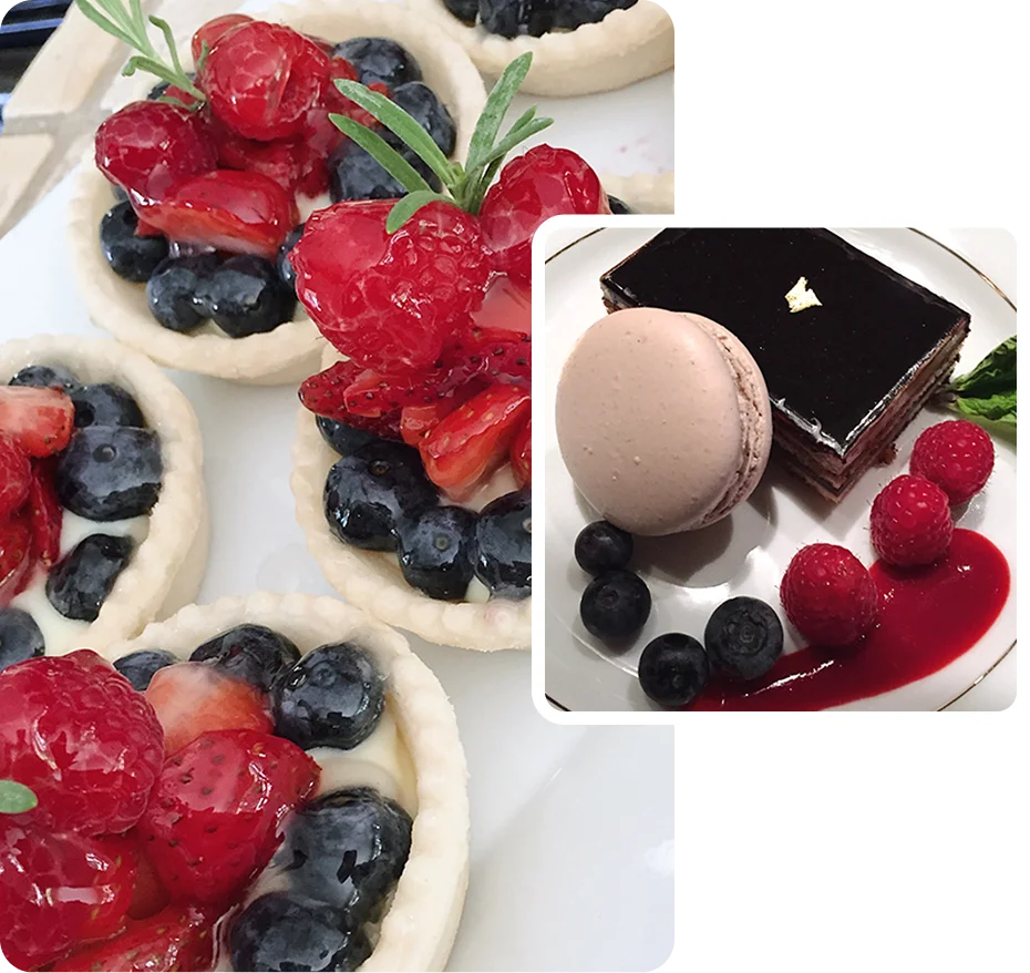 Berry tarts and chocolate dessert with macarons.
