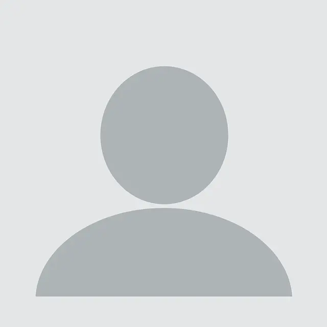 Default profile picture silhouette on gray background.