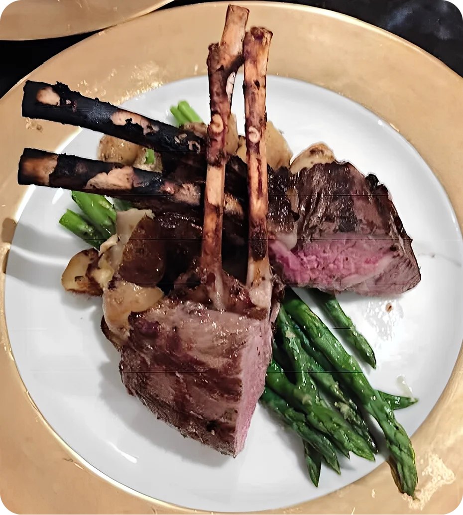 Grilled lamb chops with asparagus and potatoes.